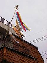 Fish kites from a balcony