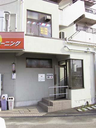 Computer Information Techology, Barbershop and ever present trash and recycling containers at street level.. 2nd Floor businesses