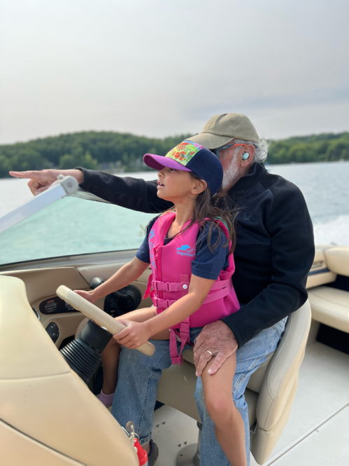 Steering the boat.
